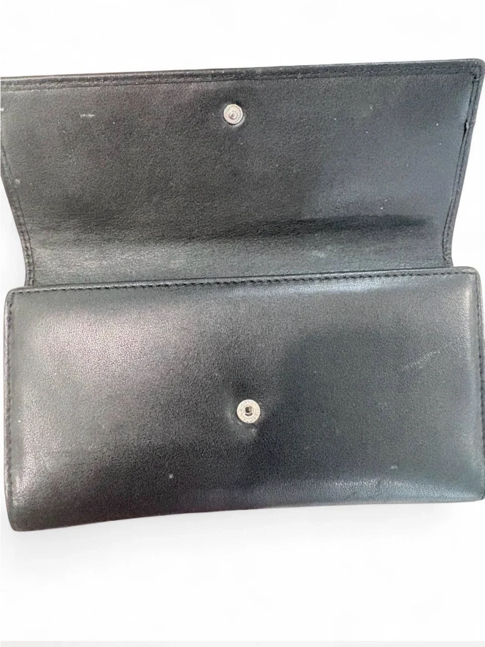 Coach Black Leather Fold Wallet with Subtle Ruched Detailing